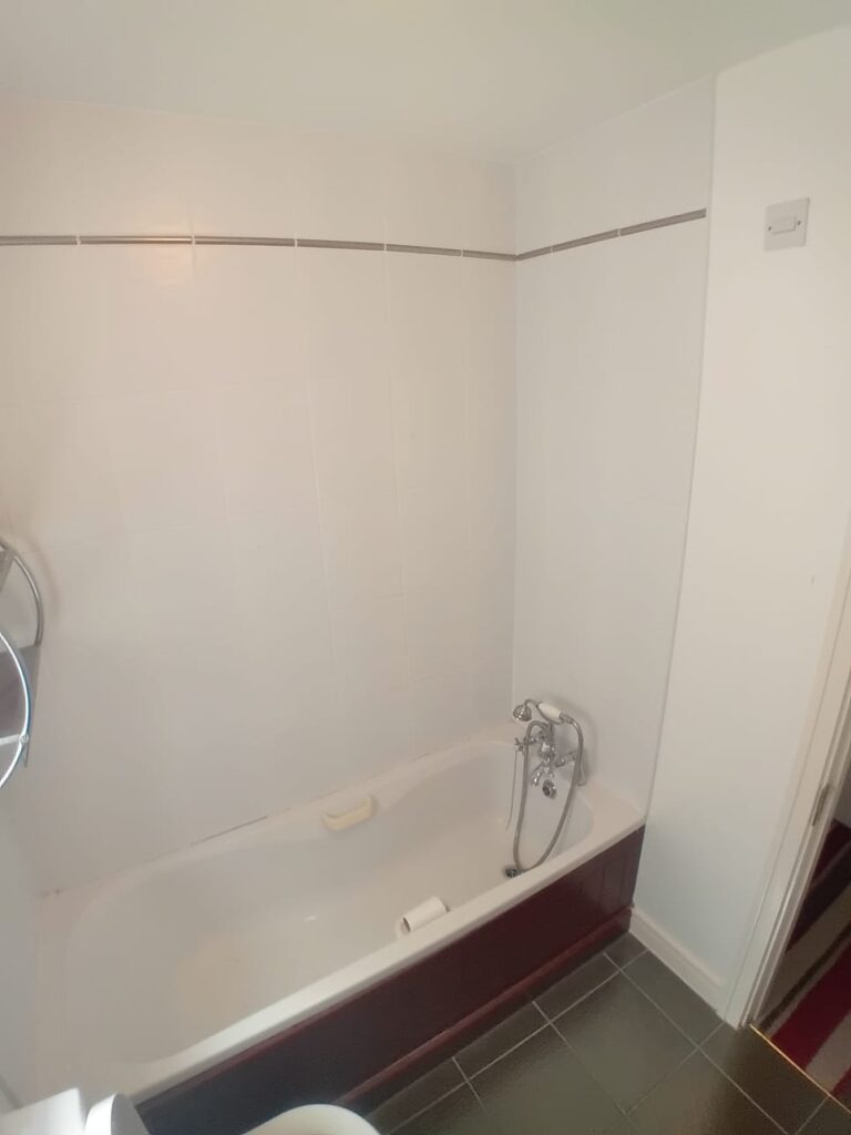 This image has an empty alt attribute; its file name is Before-Bathroom-Installation-Bath-Removed-768x1024.jpg
